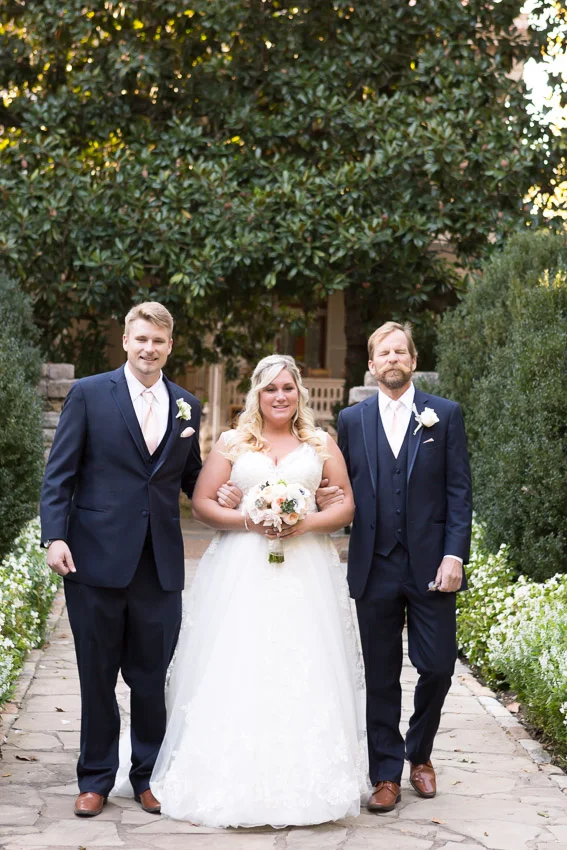 father-and-brother-walking-bride.jpg