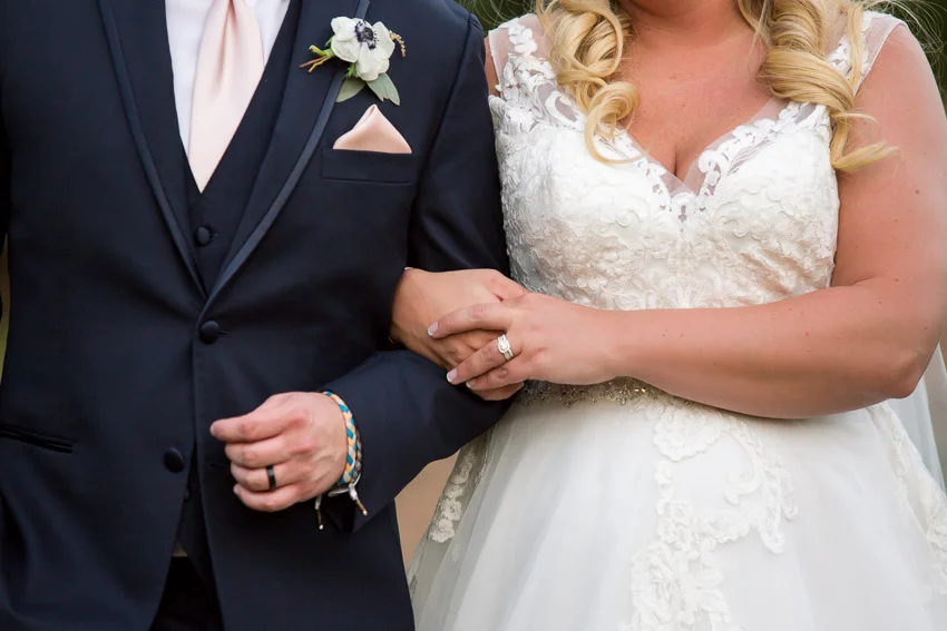 bride-and-groom-linked-arms.jpg