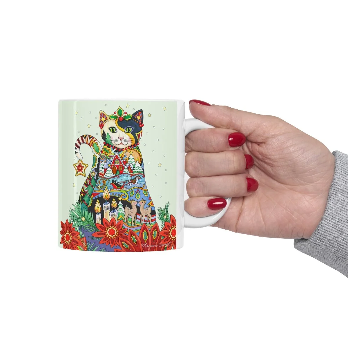 Christmas cat mug in hand