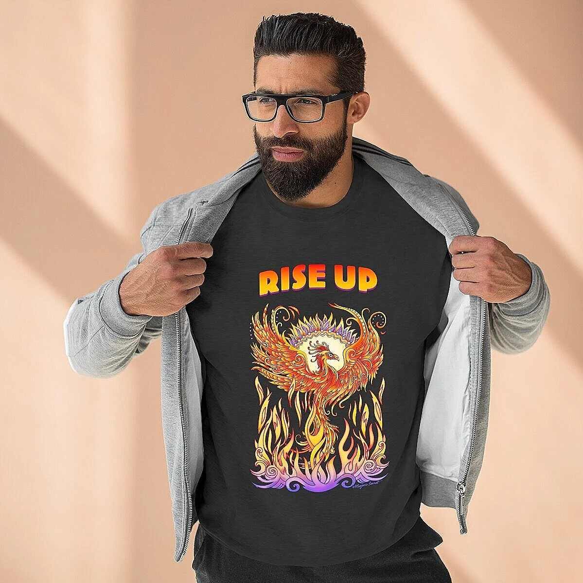 Man wearing sweatshirt, with wording Rise Up and artwork of phoenix rising from flames