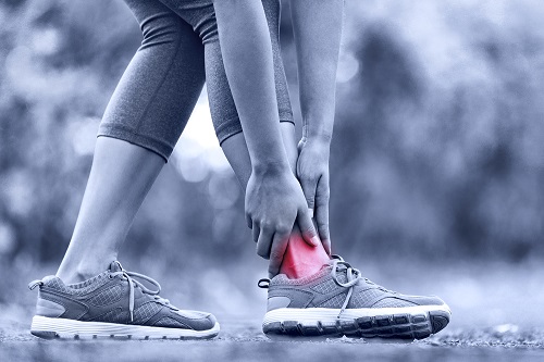 Female runner feels pain in her ankle
