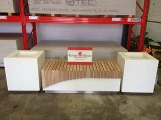 Corian and hardwood seater and planters East Kilbride.jpeg
