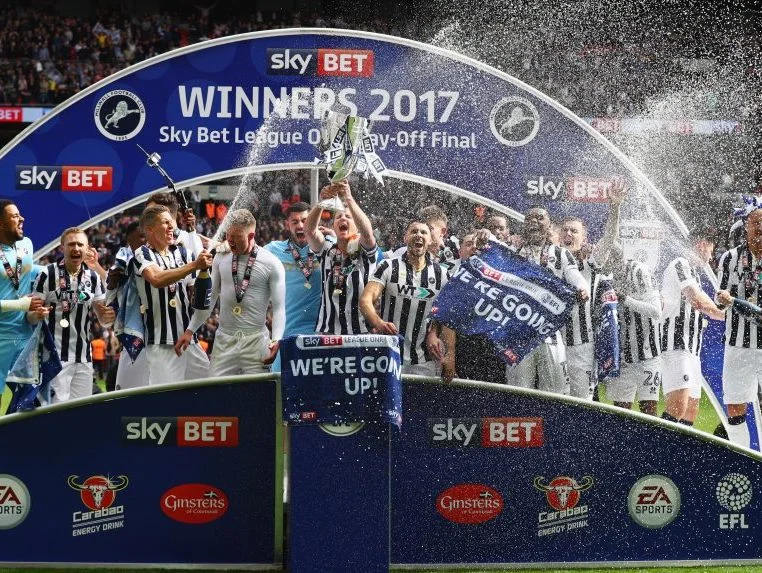 Millwall FC team celebrates the EFL Play Off Final victory