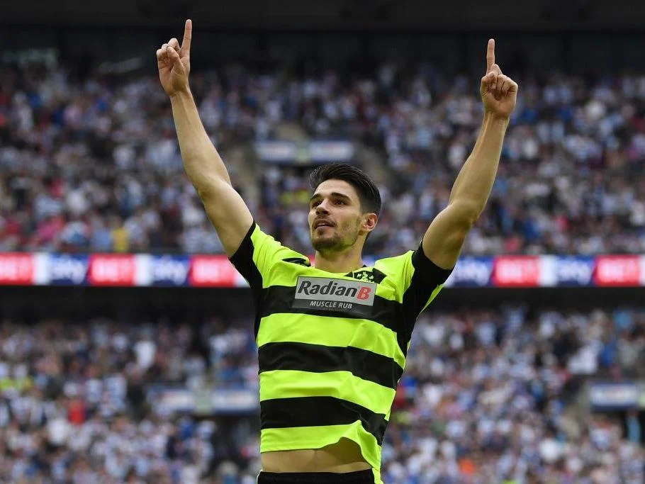 Huddersfield Defender Schindler celebrates his penalty decider