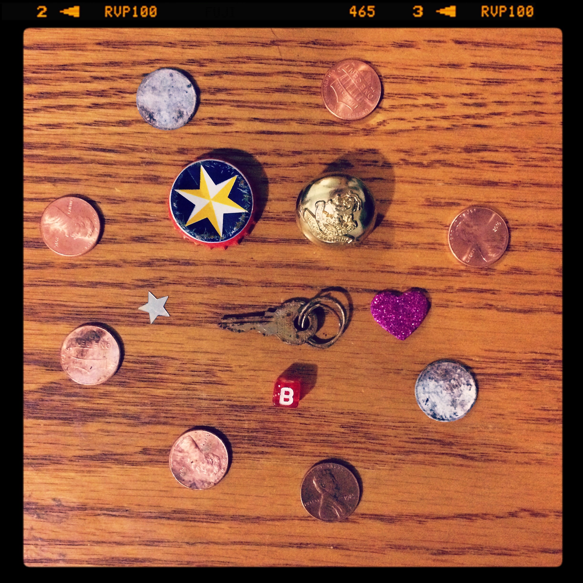 One of my favorite days' finds: a beautiful bottle cap, a small key, and a button featuring a rampant lion - my favorite heraldic symbol!