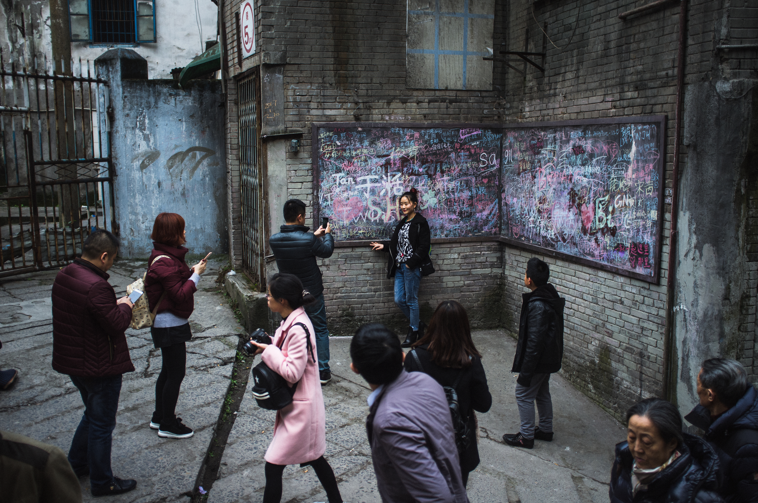 For now, Shibati acts as a laissez-faire tourist hub where street hawkers sell nostalgic paraphernalia and visitors take photographs among the ruins that will soon be replaced with tower blocks. Chongqing, January 2017