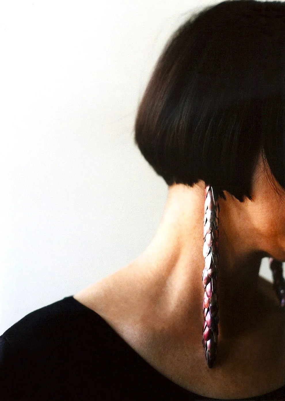 Long Pink Elytra Earrings (closed). Anodised aluminium and silver. 2002