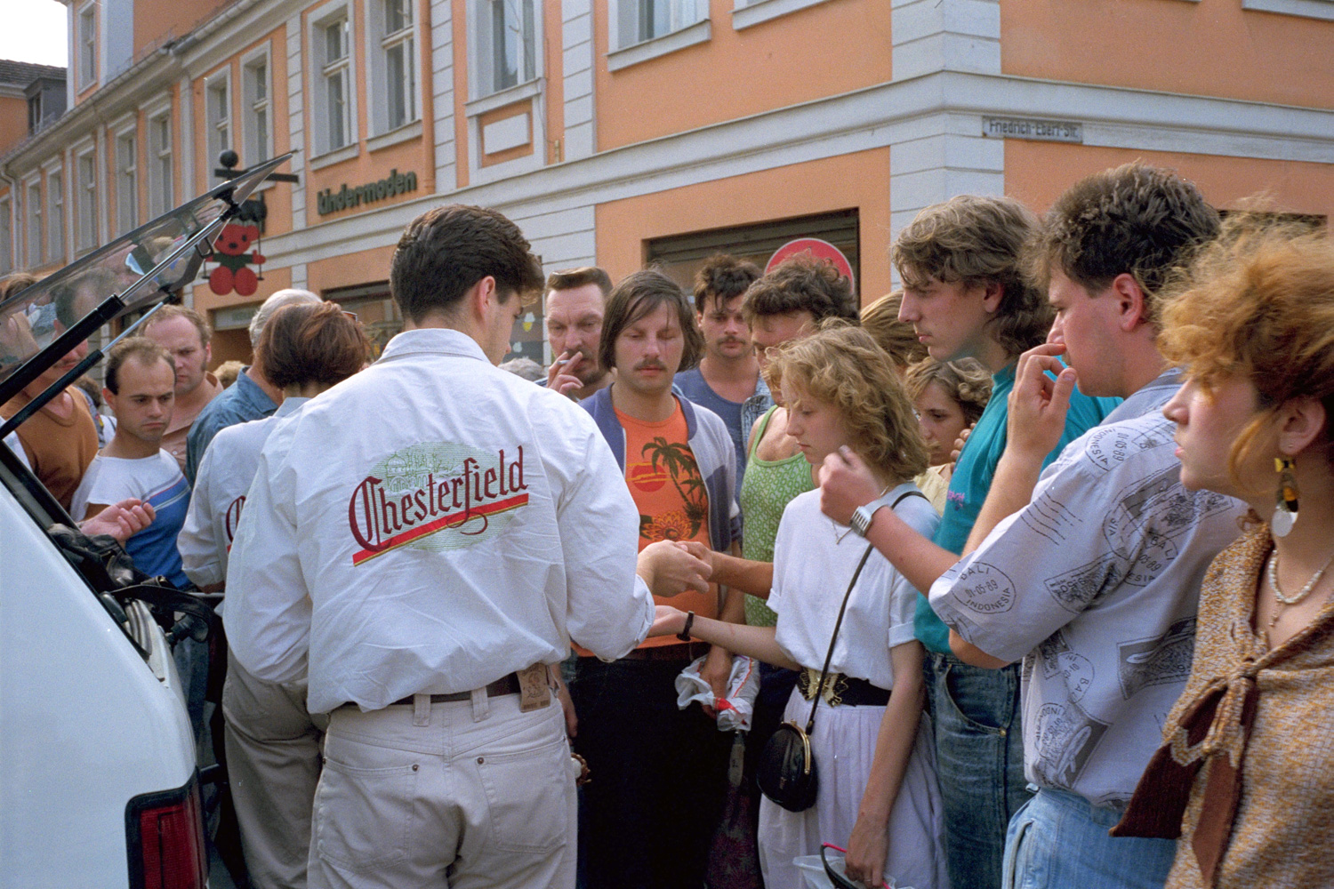 Cigarette salesman and Van - Potsdam. The introduction of new products to the Eastern market seemed to be especially visible in the street level campaigns run by Cigarette companies, porn and the banks.