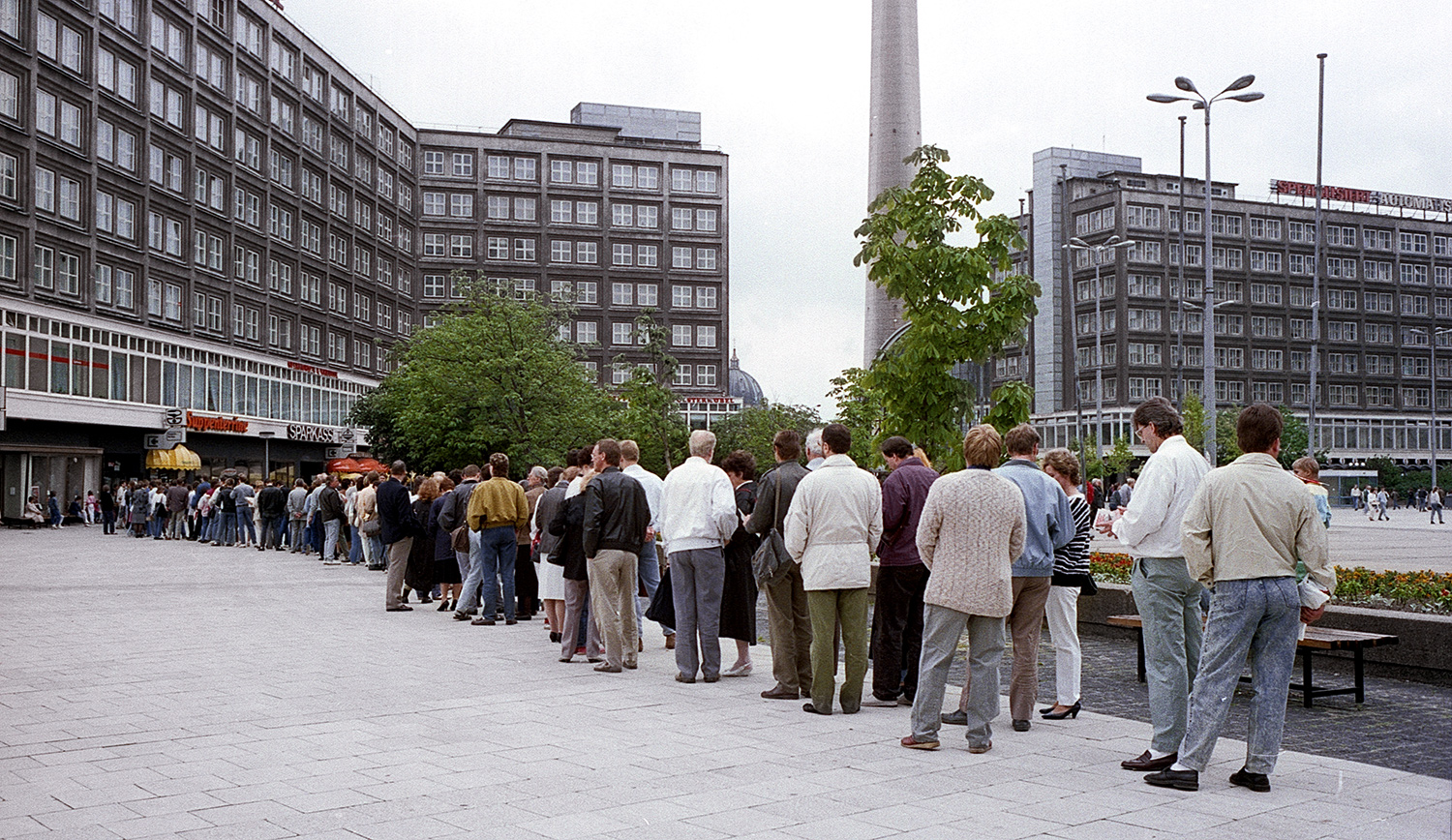People lining up to open a new bank account - Late June or early July East Berlin.