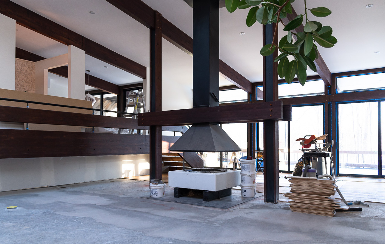 Renovation begins…the home’s original fireplace still a central part of the living area
