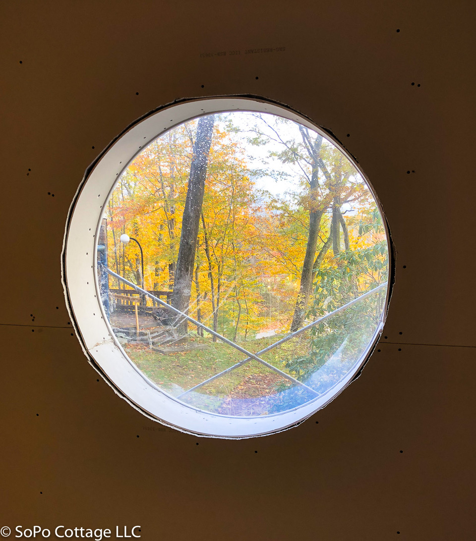 Laurel worked with Maine Preservation to identify key historic features of the home, like this original bubble window in one of the bedrooms