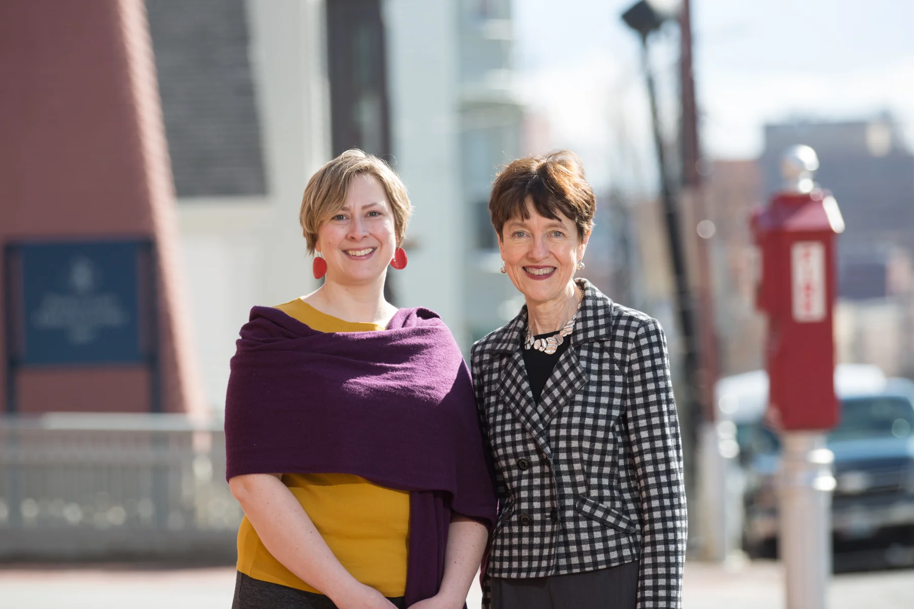 Sarah Hansen and Hilary Bassett in front of the Portland Observatory, Photo by Rhonda Farnham