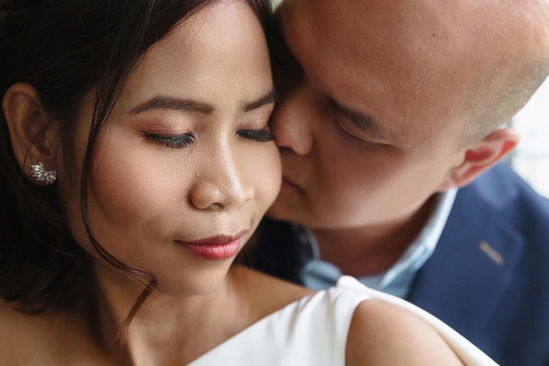 {Tenderness}
Desmond, the gentle giant, and Ada make a lovely pair. When they're together, they give off a comfortable soft vibe.
We took advantage of the brief window to capture a few couple portraits before gearing up for the start of the wedding c