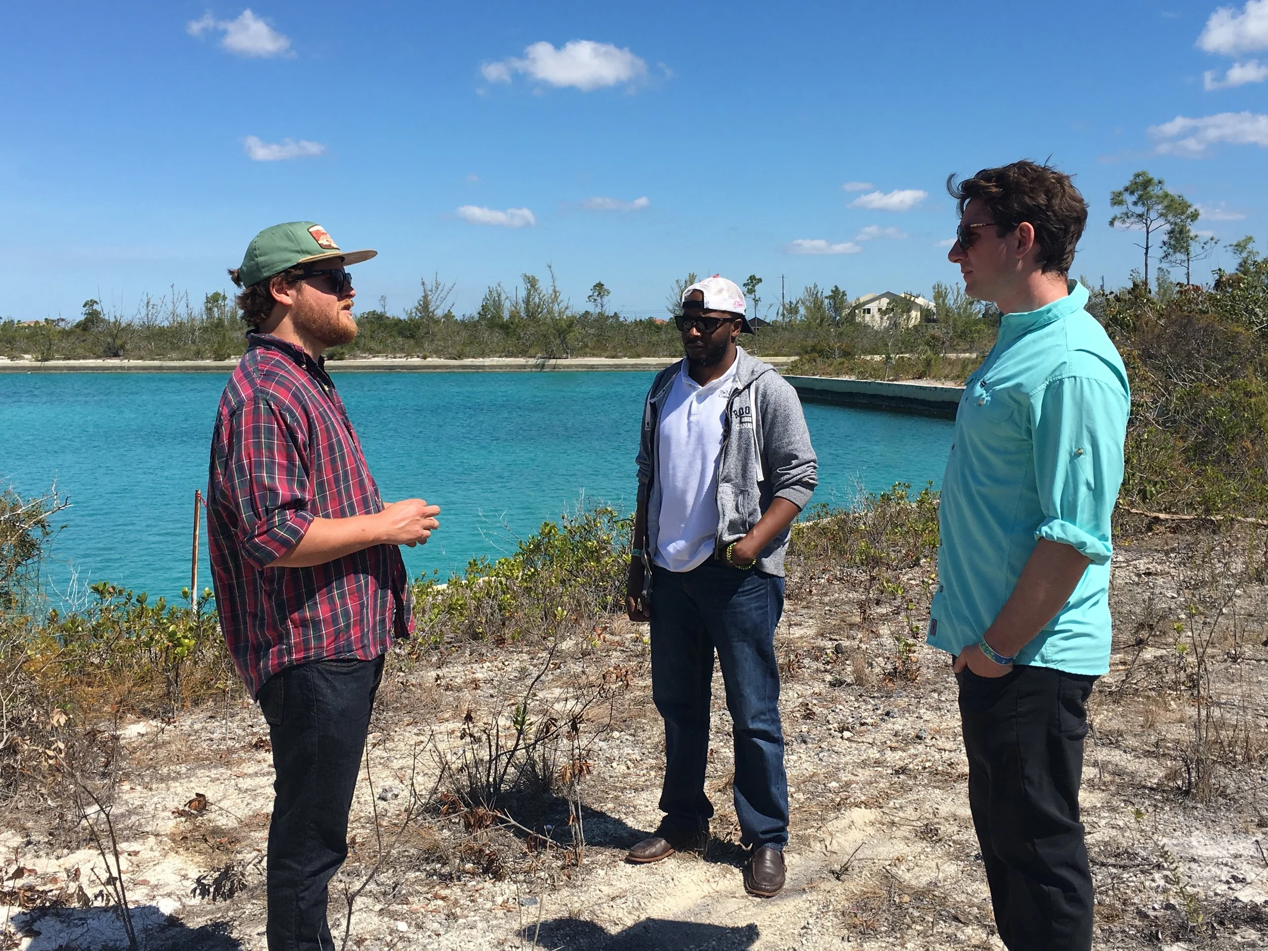 Gator sharing visions of global-scale reef restoration with the The Nature Conservancy team, starting here at the farm site in Grand Bahama.