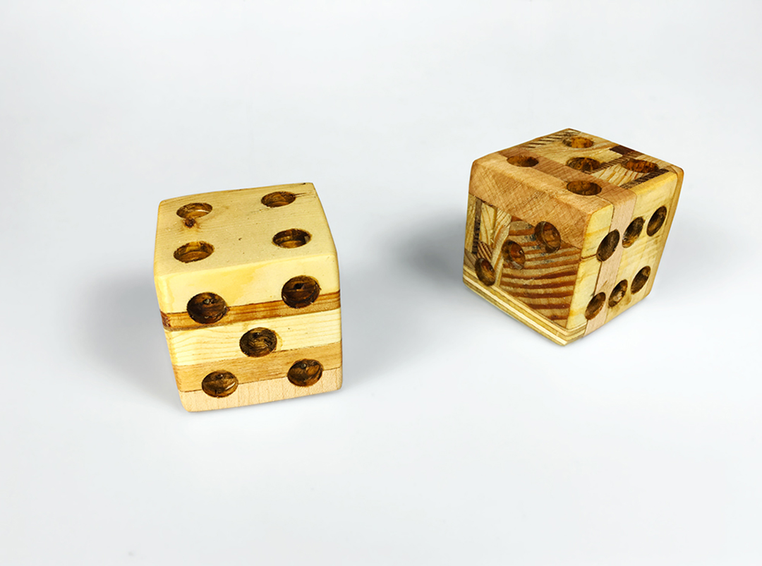 Loaded Dice: Dice Unevenly Internally Weighted With Meteorites (2017)