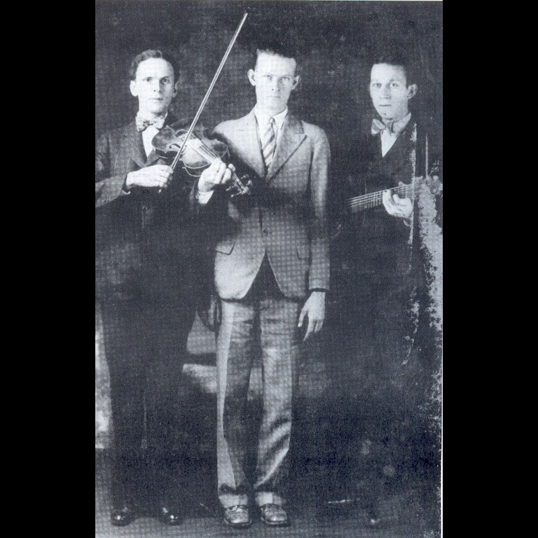  Dance caller, Ernest Legg (center) with the Kessinger Brothers (Charleston, WV, 1928) 