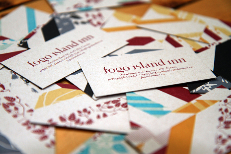 Business cards with Inn identity on custom pattern