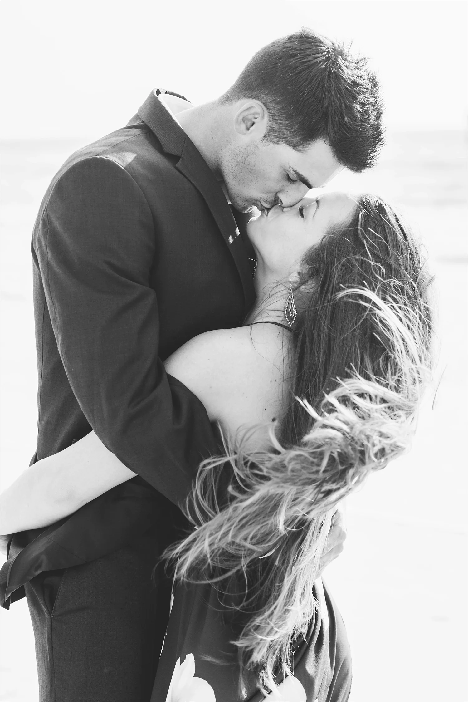 It was crazy windy on the beach because of the storm and Kathryn did a great job embracing it and letting her hair go with the flow (literally)!