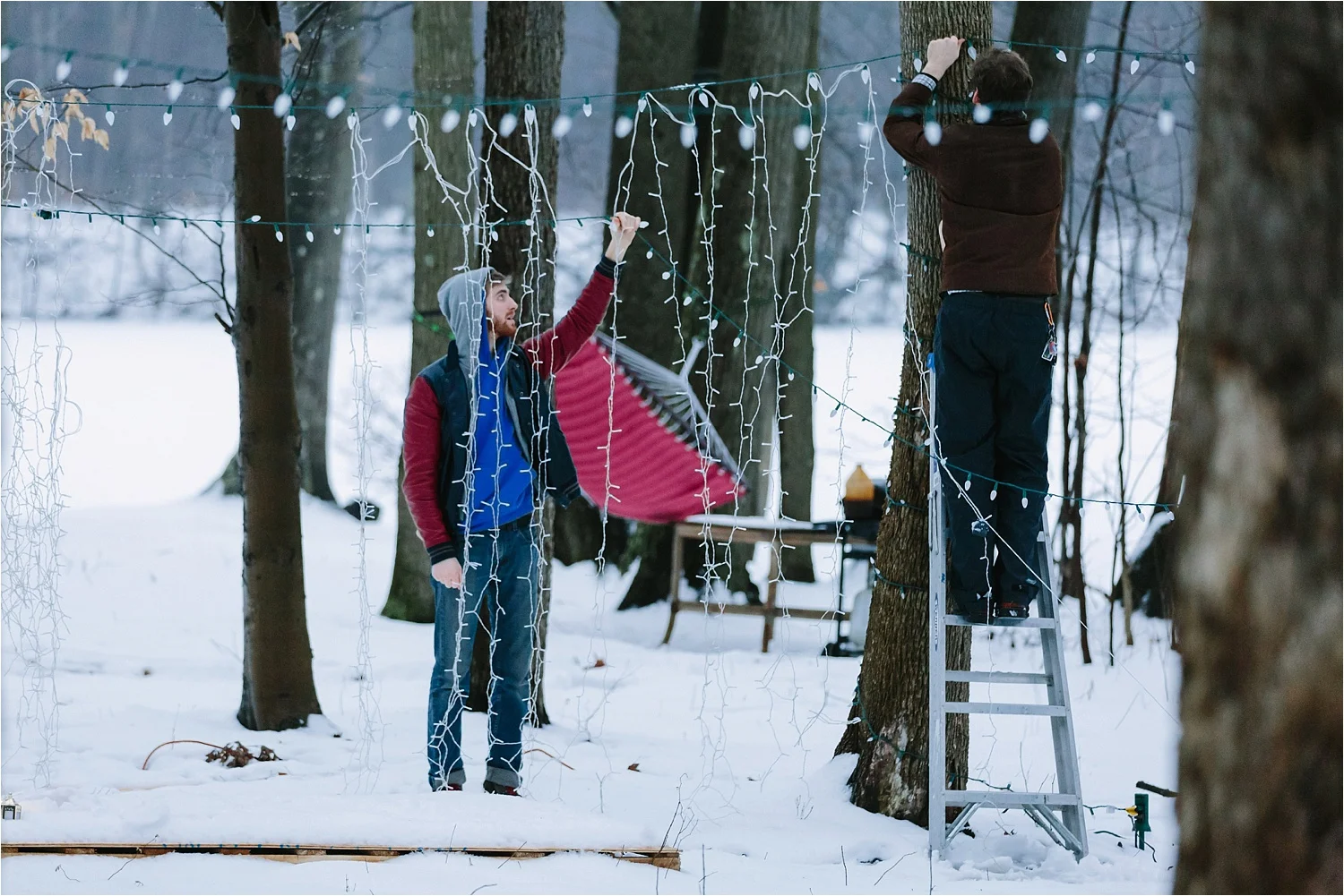 Brian and my fiancé, Donny, setting up lights a few days before the proposal.