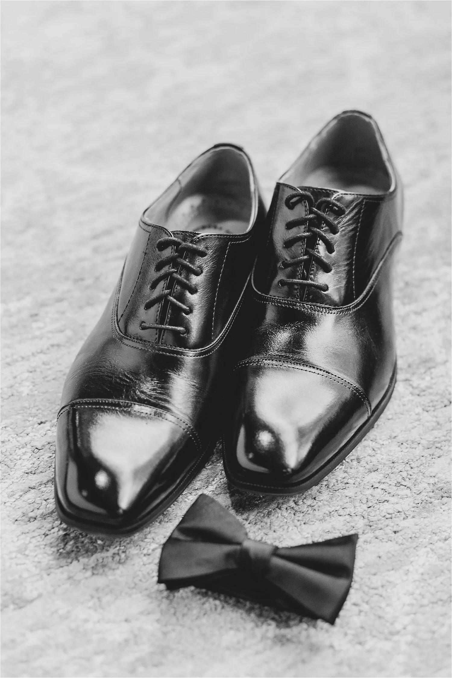 2019-12-31_0022.jpg grooms wedding shoes and bowtie at the arcade in cleveland
