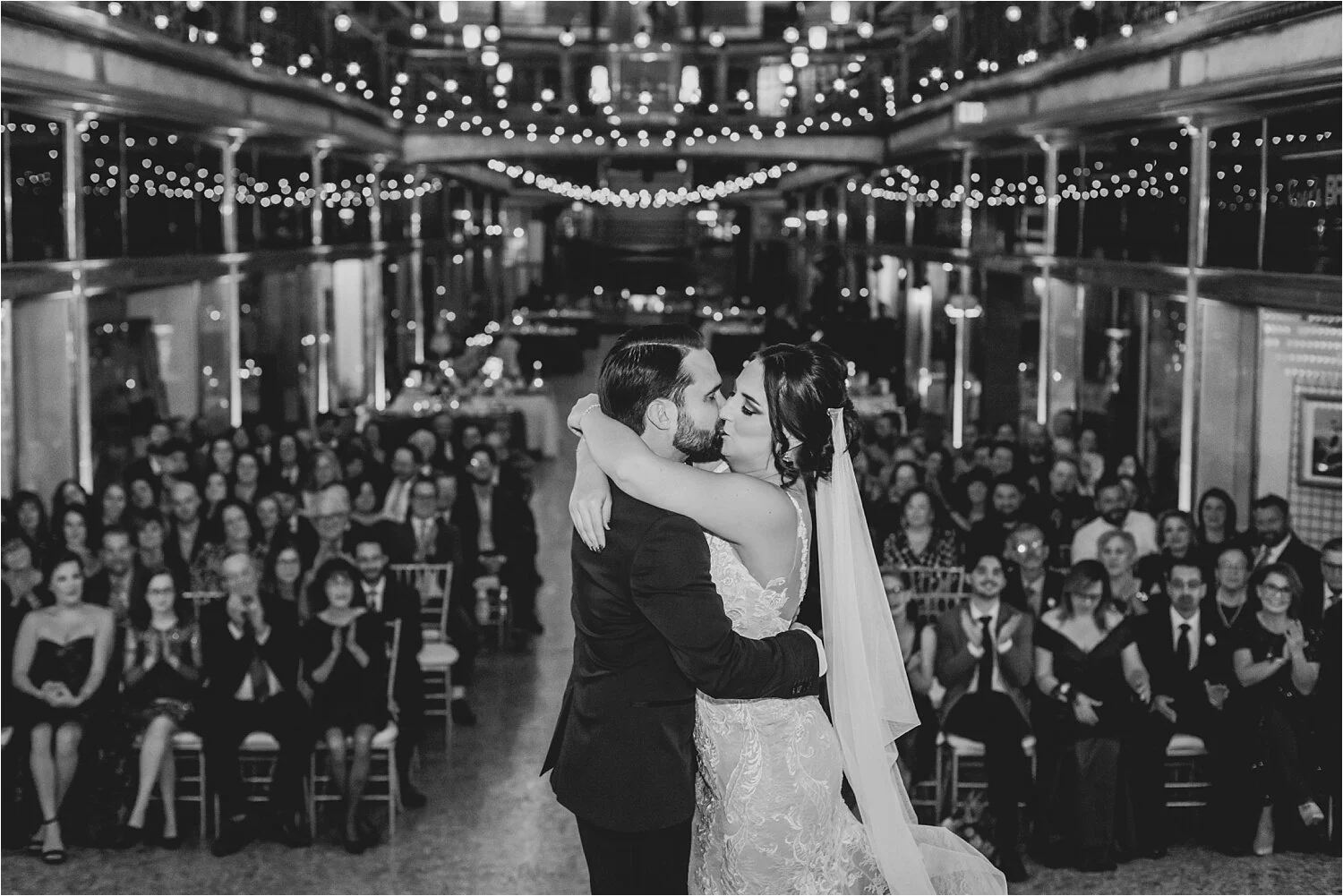 2019-12-31_0077.jpg wedding big kiss at the arcade in cleveland