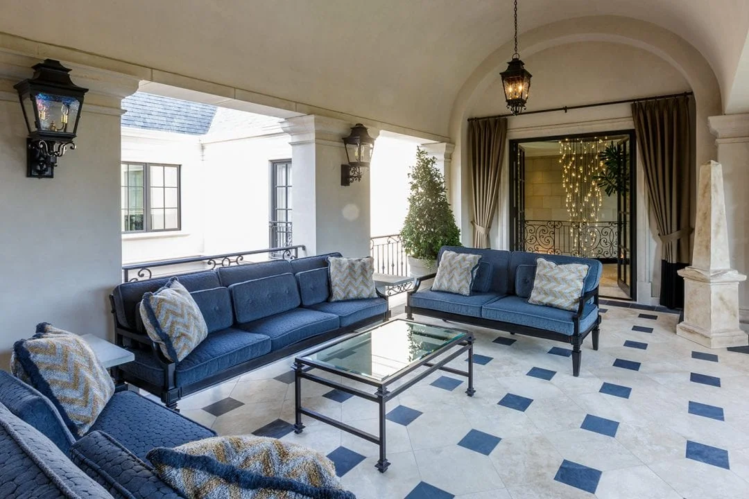 Cobalt blue is the accent color of choice in this room from a Neoclassical home by Robbie Fusch. (This photo is copyright of Fusch Architects, Inc . Chambers Interiors & Associates was granted permission to feature this image).