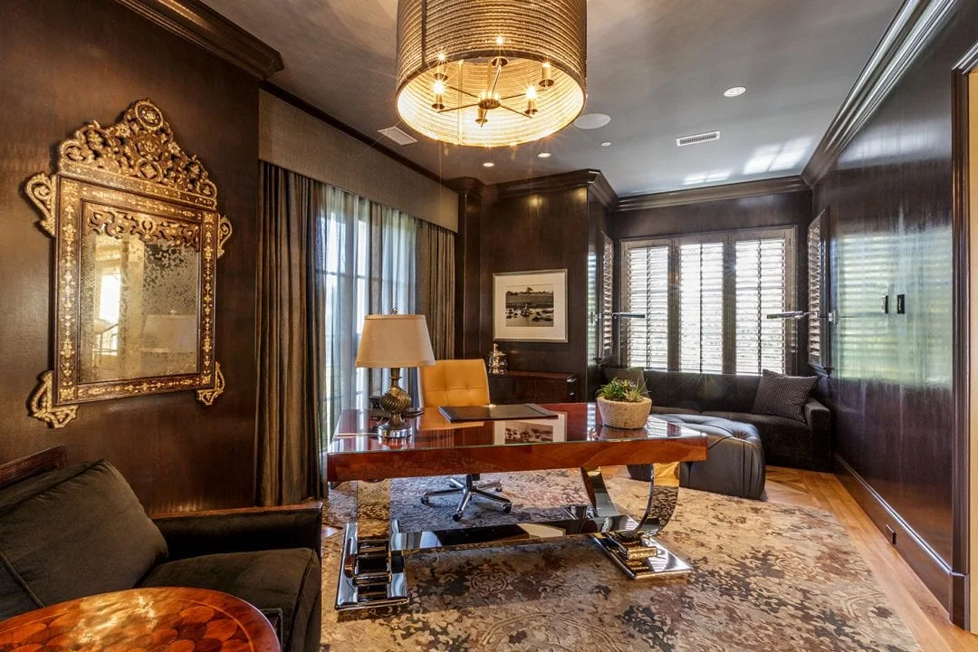 In a Lexington home designed by Robbie Fusch, this mirror with a gilt frame makes a stunning statement piece. (This photo is copyright of Fusch Architects, Inc. Chambers Interiors & Associates was granted permission to feature this image).