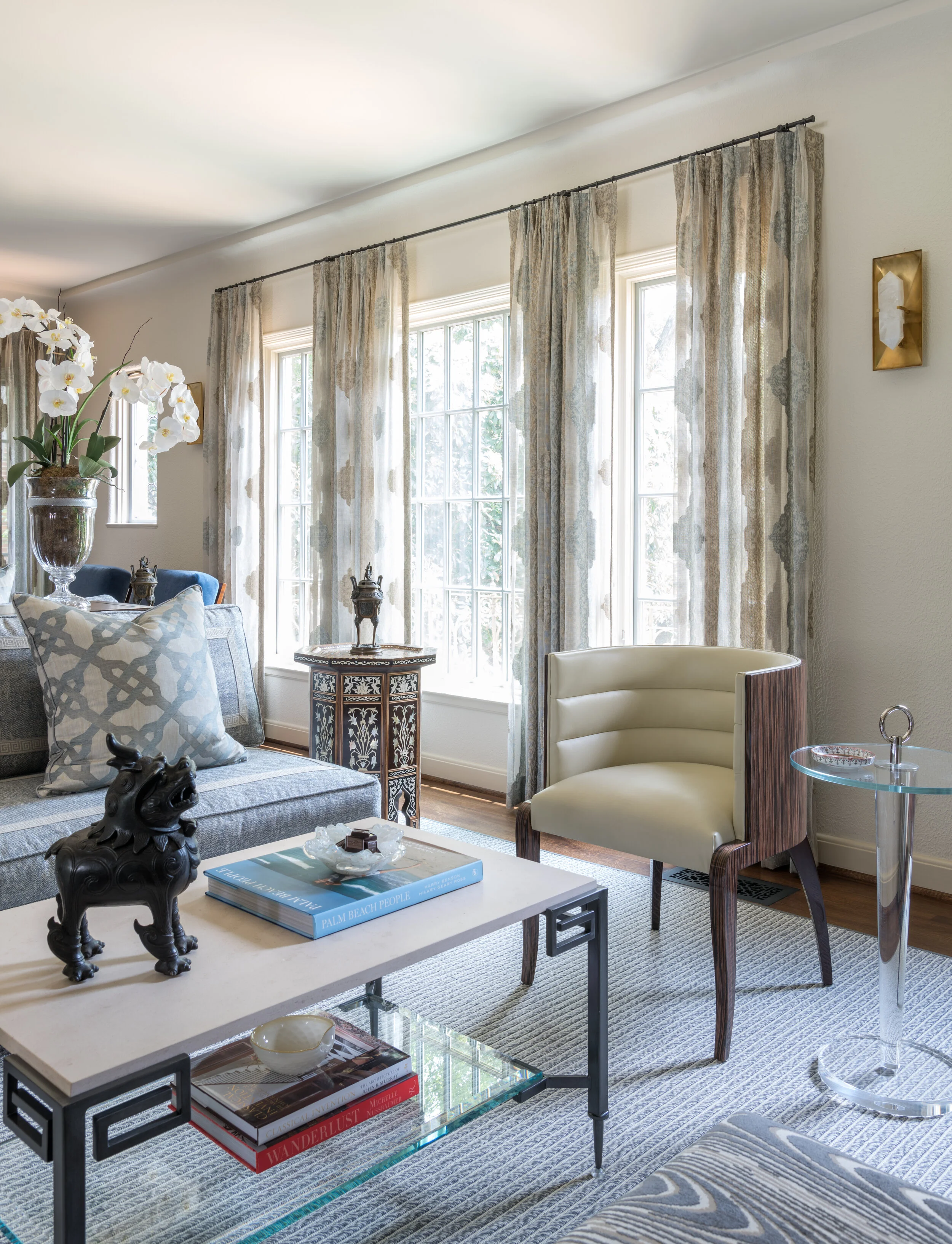 hanging egg chair in living room in 2 1 2 men show on Furniture Blog Chambers Interiors
