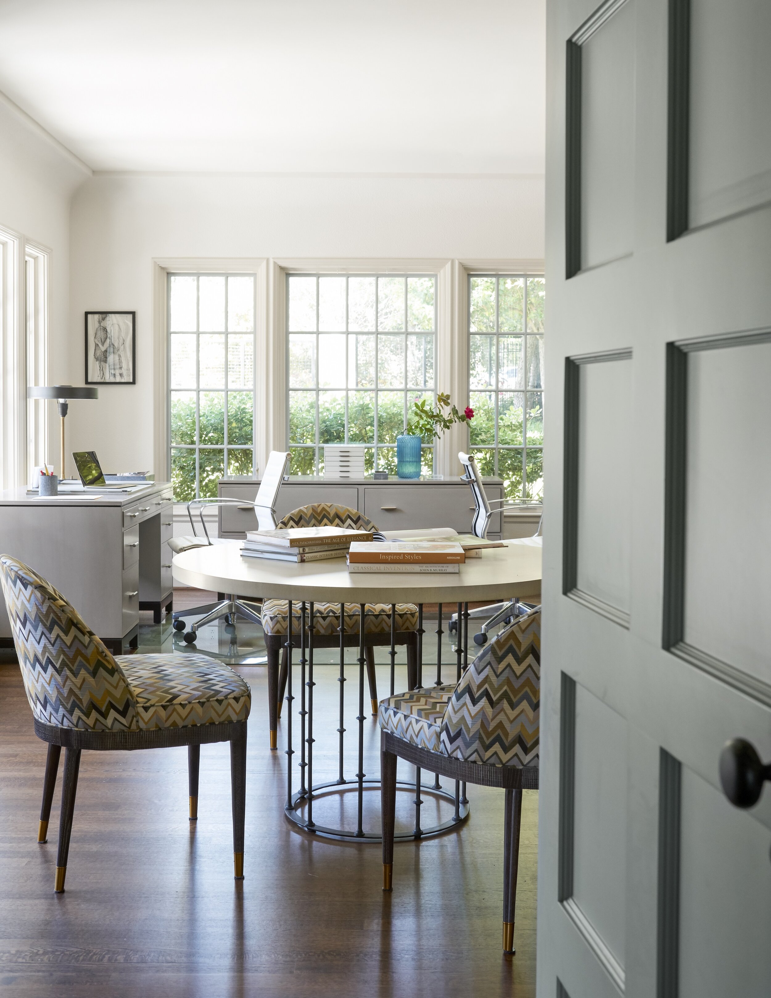 hanging egg chair in living room in 2 1 2 men show on Furniture Blog Chambers Interiors