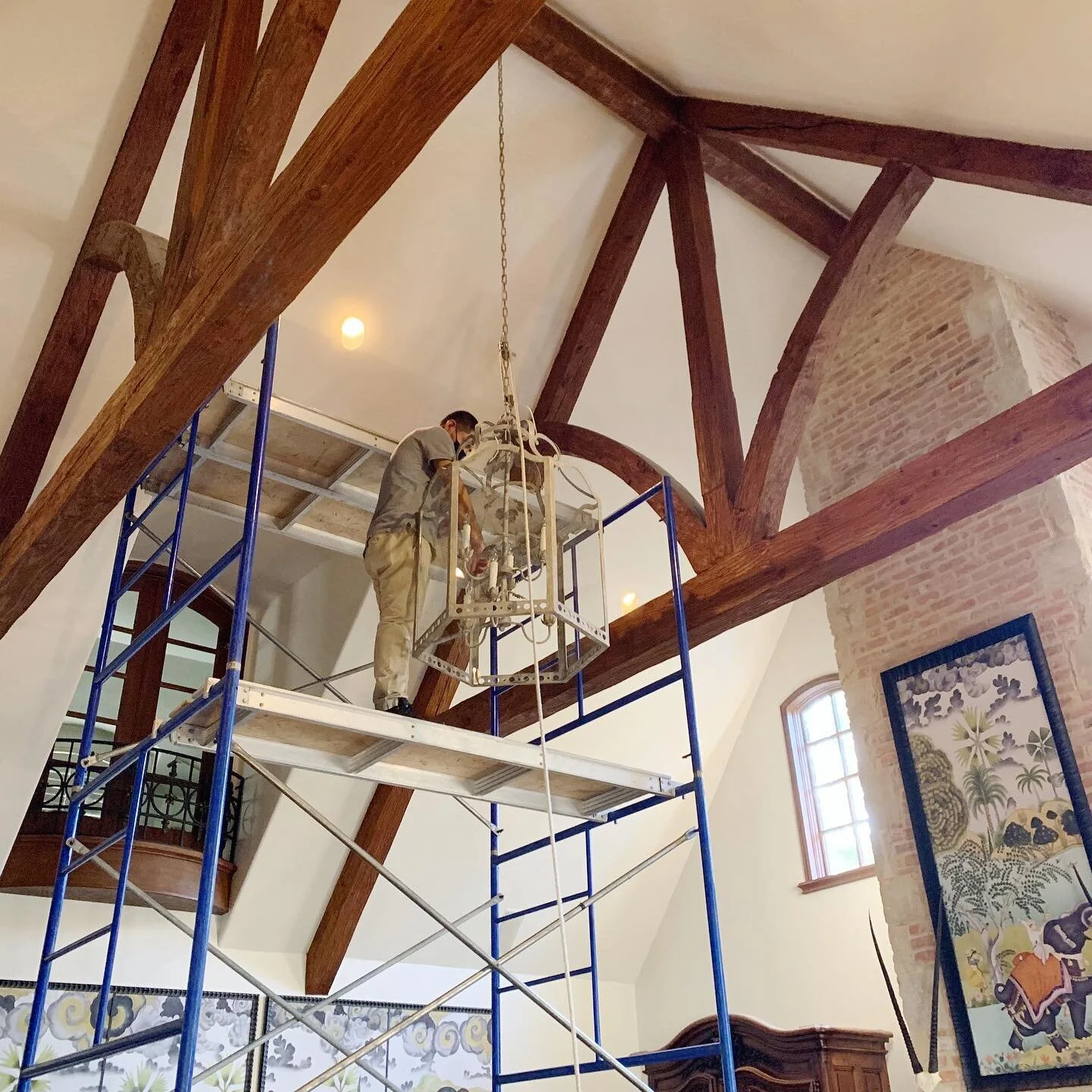 There&rsquo;s nothing like installations! Watching this spectacular custom chandelier go up in our client&rsquo;s great room was so satisfying. It couldn&rsquo;t have gone better with the @schumacher1889 panels framing the room. #lighting #chandelier