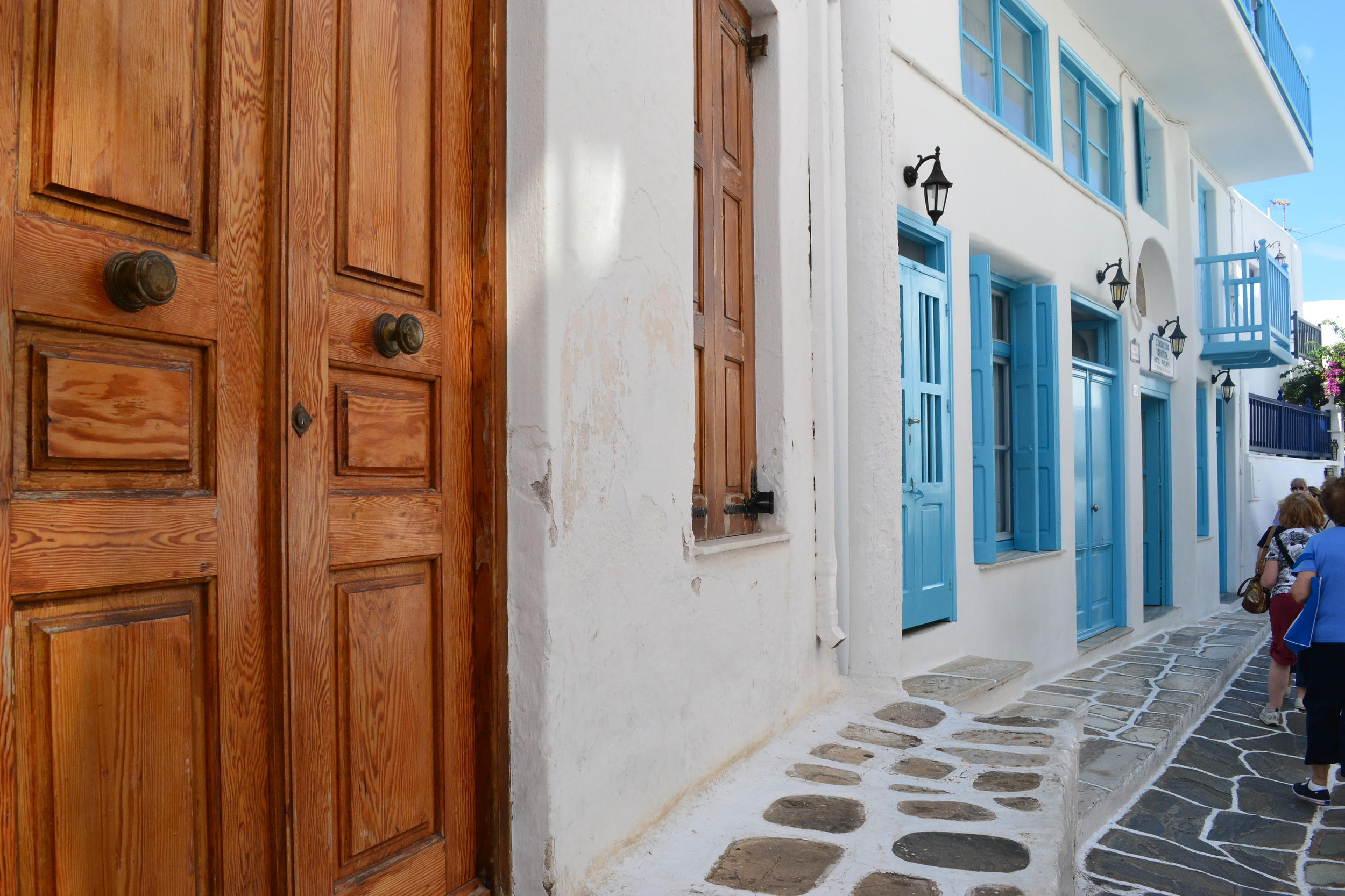 I was in love with Mykonos's white washed tiny streets and colorful doors.