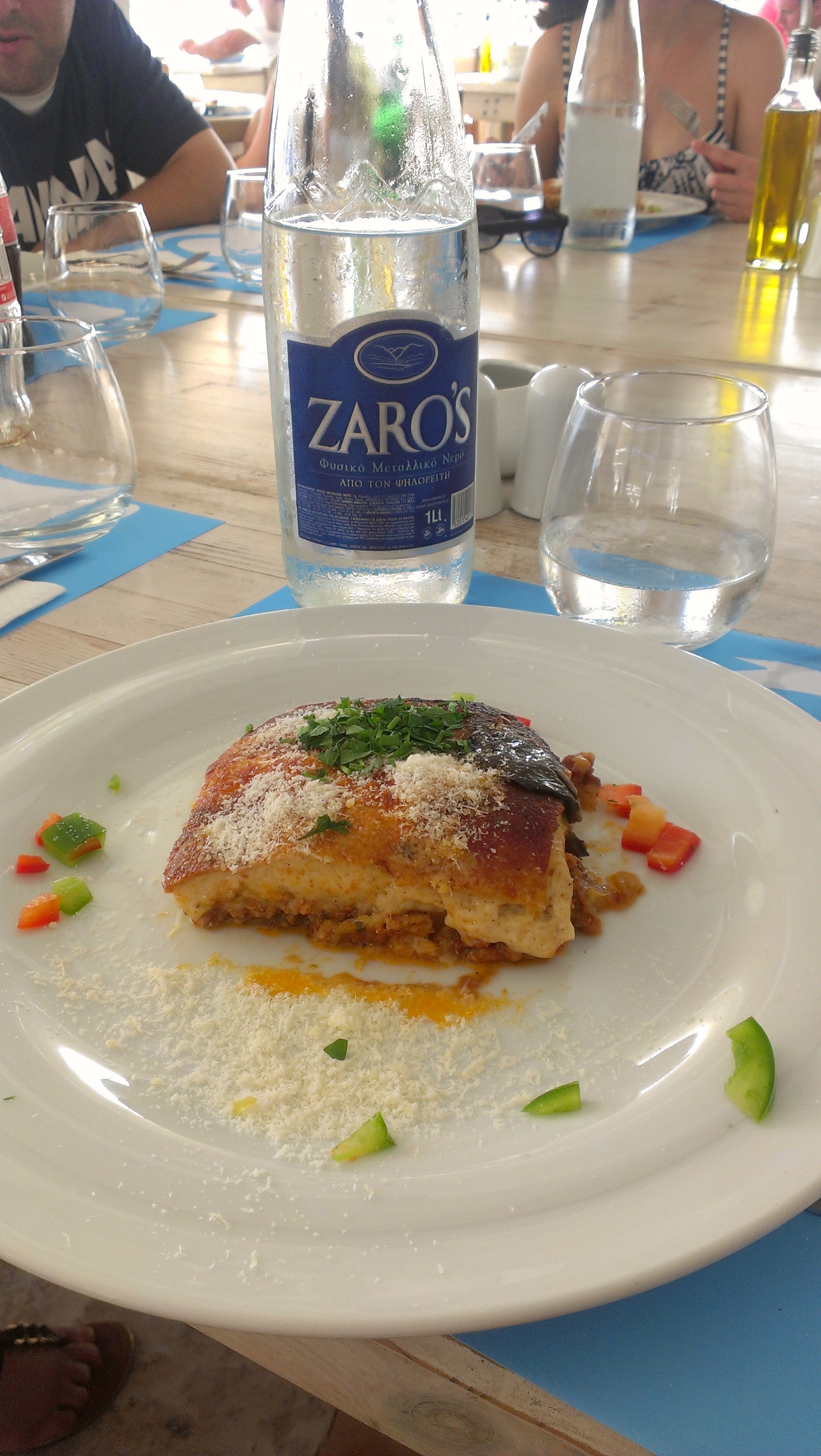 I give you THEE BEST Mousaka -- A baked casserole of eggplant, zucchini, tomatoes, and minced lamb or beef under a lush layer of béchamel sauce.
