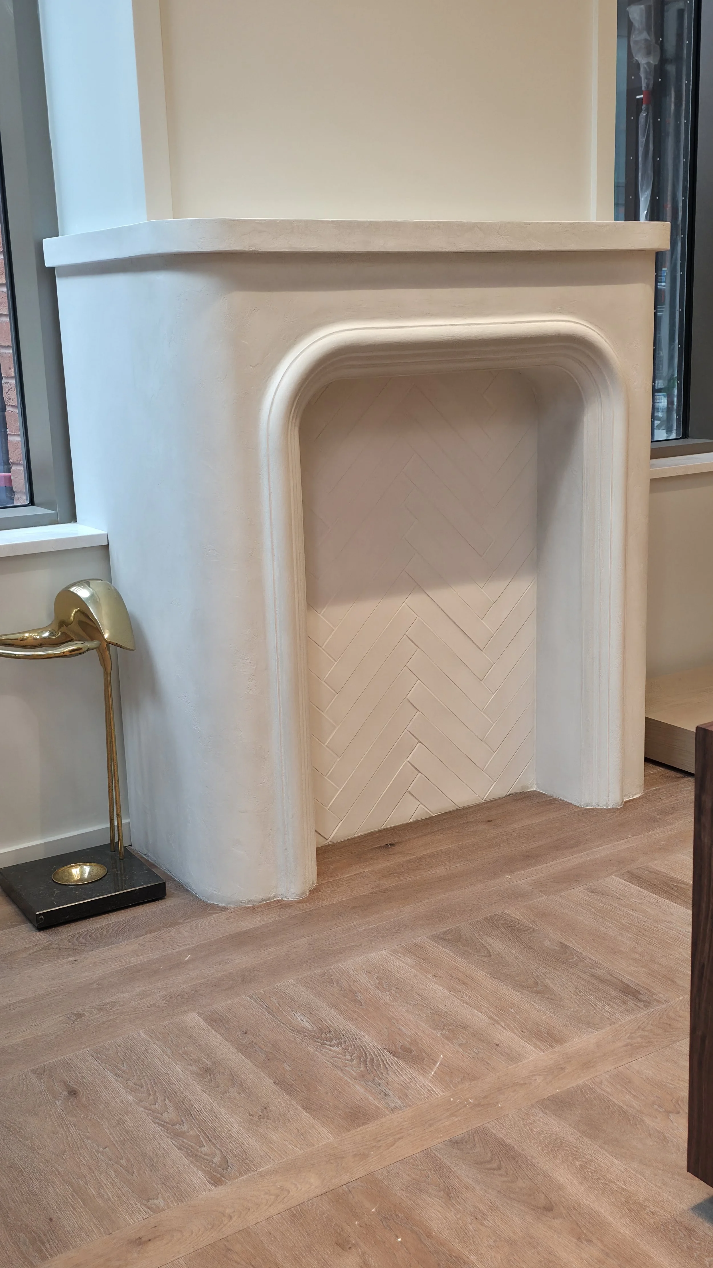  Marmorino finish  with more marble dust and lime content than water! Our formula delivers a lustrous and durable finish with no acrylic. &nbsp;Hand trowelled over a fireplace in a retail space in Summerhill Toronto 