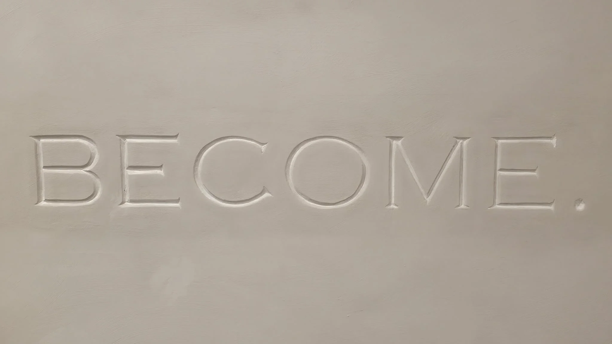  Lettering inset into a limewashed wall 