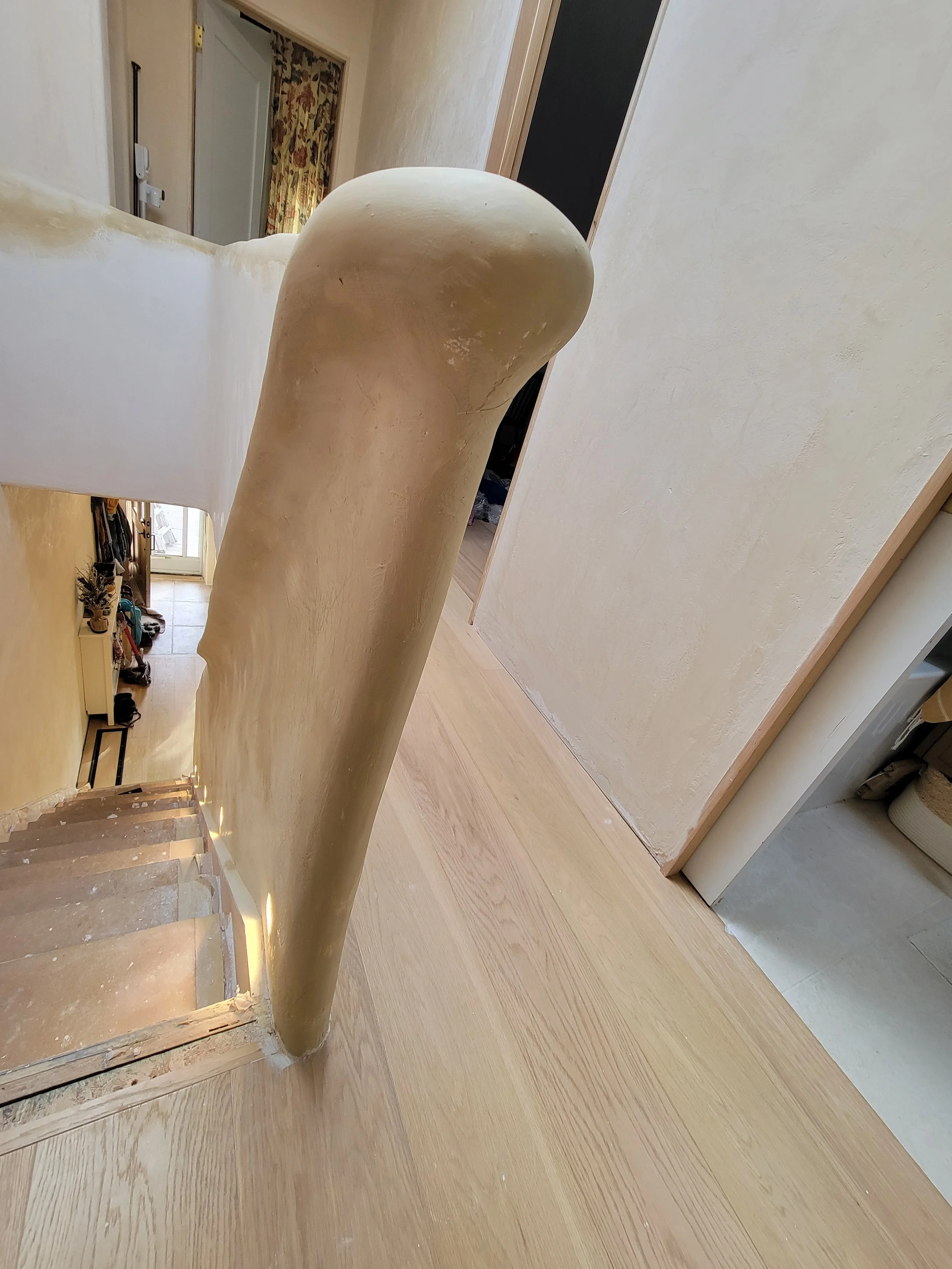  Solid plaster sculptural stair railing 