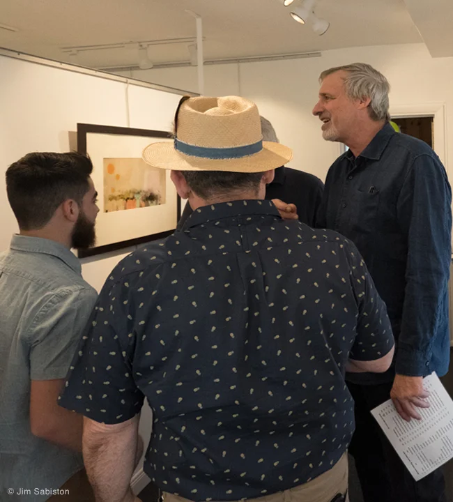 Artist, Adam Straus was in the house, enjoying the exhibition with friends.