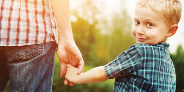 2. Young kid holding dad's hand.jpg