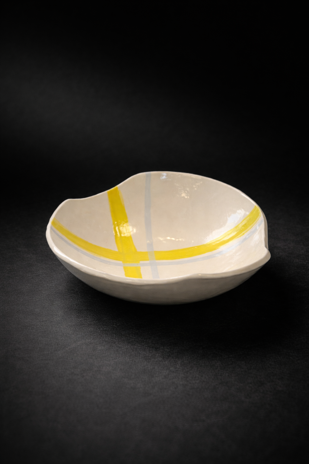 Asymmetrical elegance in ceramic artistry.png