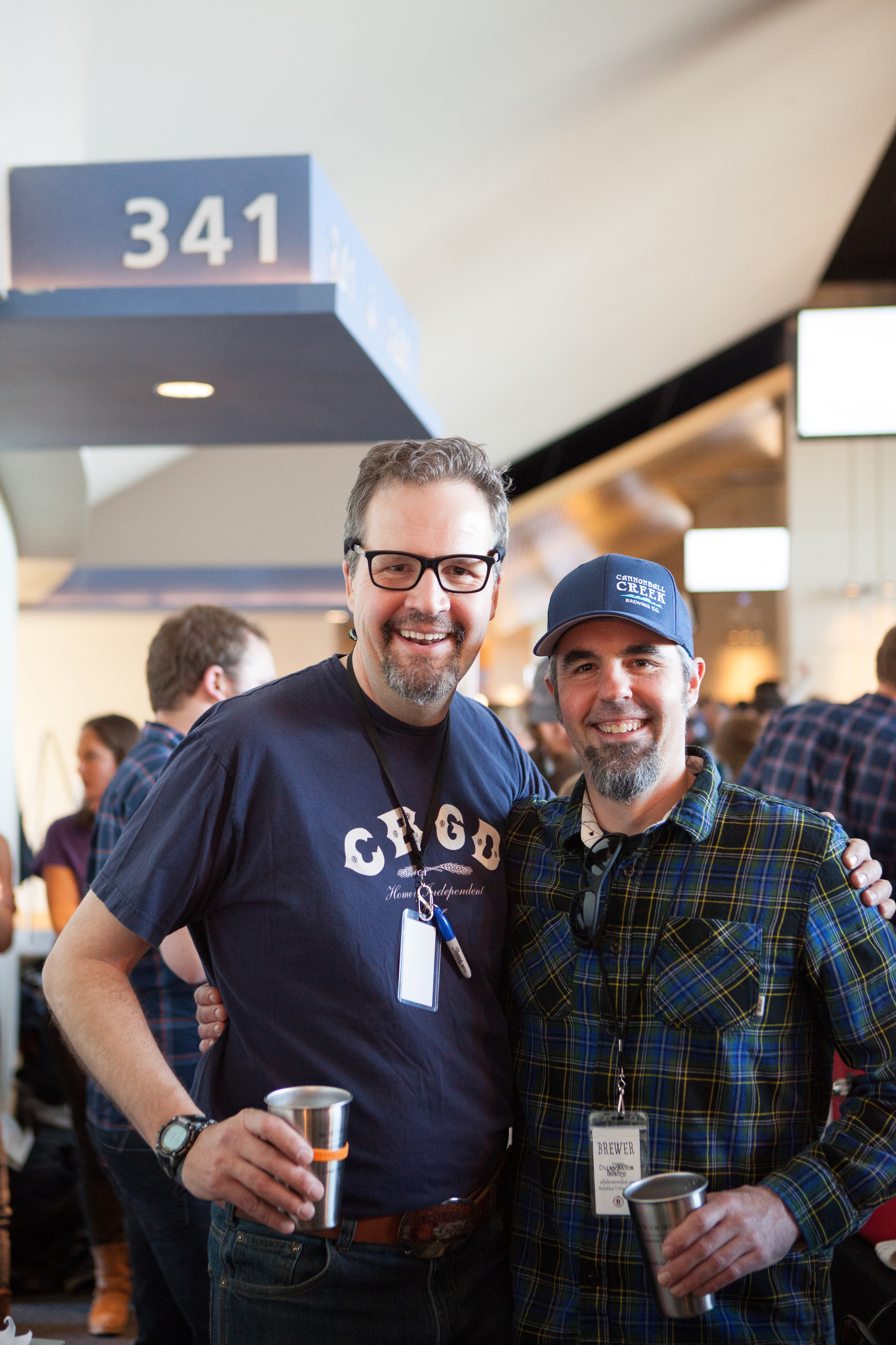   John Carlson, executive director of the Colorado Brewers Guild, and Brian Hutchinson, co-owner of Cannonball Creek Brewing Company in Golden, are just some of the 2,200 guests that attended the festival at Sports Authority Field at Mile High Stadiu