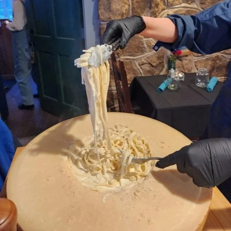 The famed cheese wheel pasta at the Black Forest Cafe north of Colorado Springs