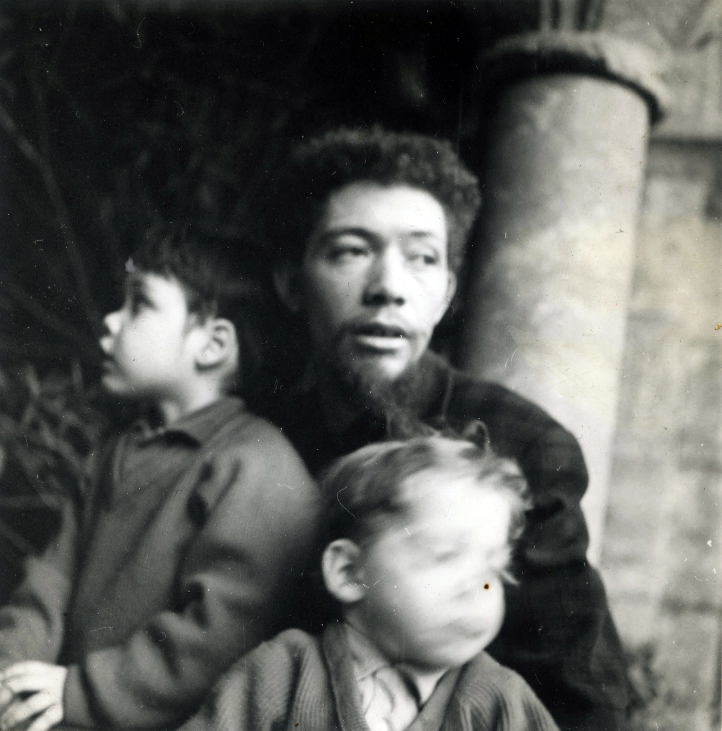  Benny Andrews with sons Christopher and Thomas at the Cloisters, New York, 1962   1959-1960  Smith gives birth to their second child, Thomas. The family moves to an apartment in Greenwich Village. For additional income, Andrews works in the Christma