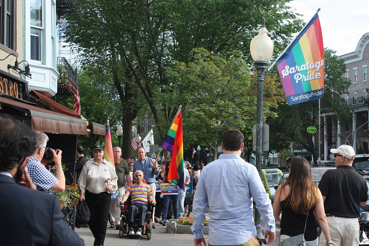 Making our way up Broadway (under one of our street flags!)