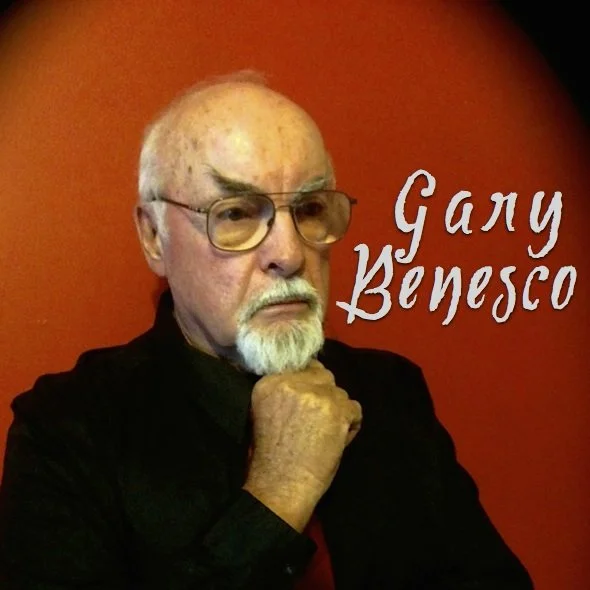 Gary Benesco headshot holding his chin thoughtfully