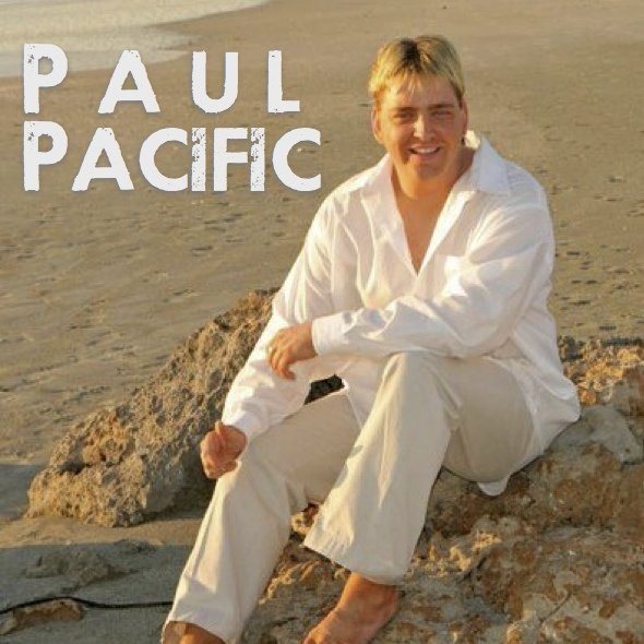 Paul Pacific headshot relaxing on a beach