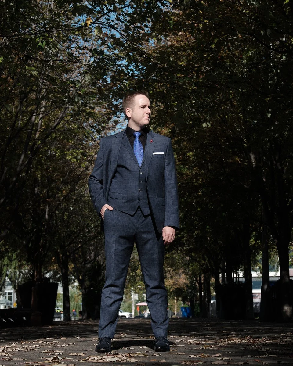 James Alan in a lane with trees promotional image
