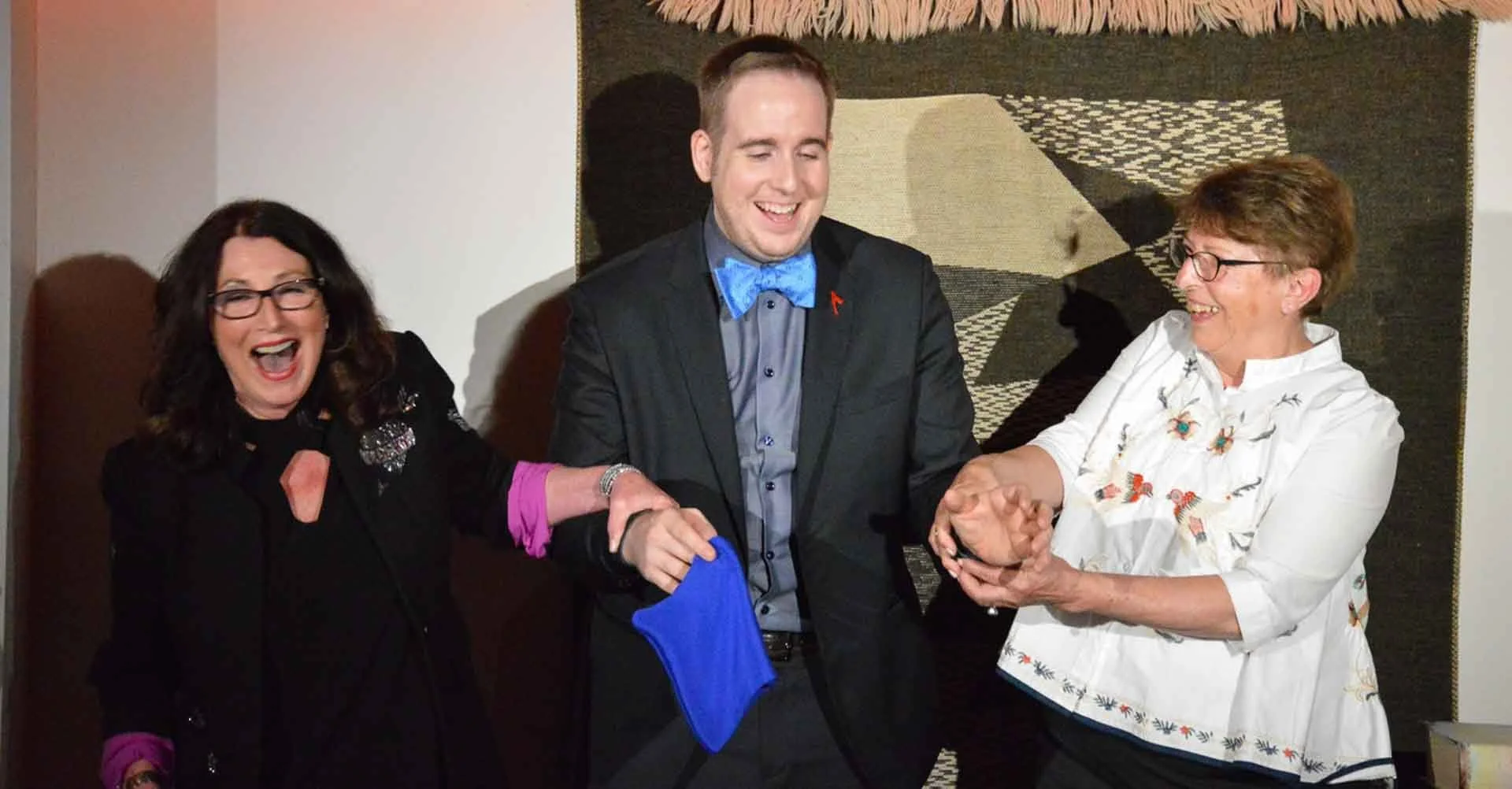 James Alan Magic and Martini at Suite 114 with two spectators laughing