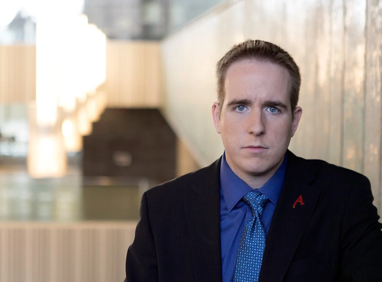 James Alan headshot top of the stairs at University of Toronto Mississauga