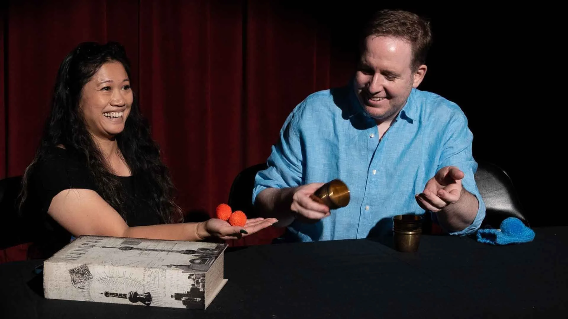 James Alan with surprised volunteer Cups and Balls at the Toronto Fringe Festival