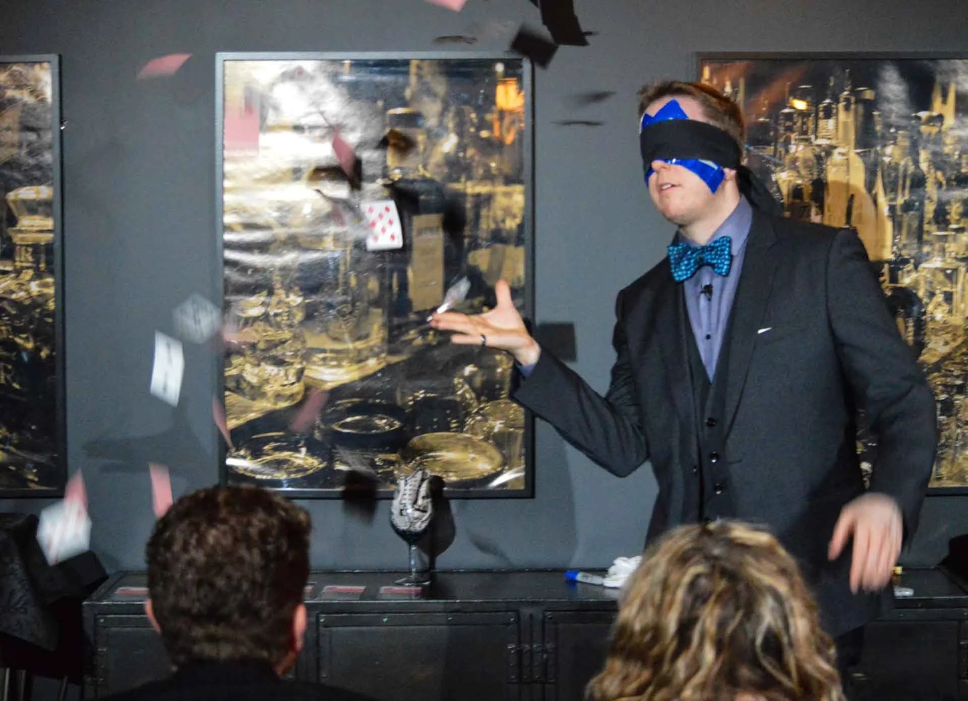 James Alan with a shower of playing cards blindfolded at Spirit House in Toronto