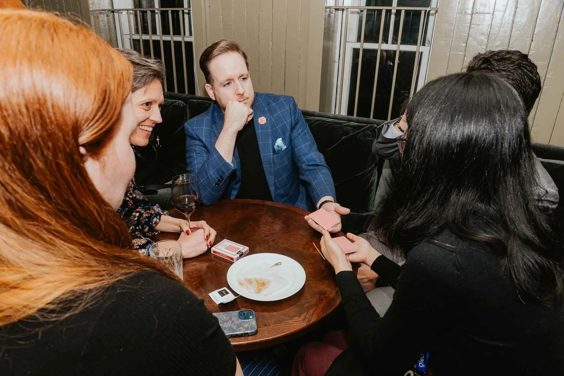 James Alan doing a close-up card trick at a technology conference  at Soho House Toronto
